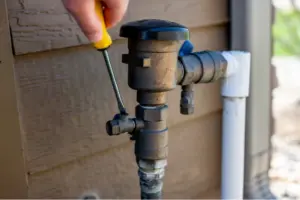 turning on the sprinkler system in spring